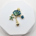 Golden sea shell necklace pendant with blue enamel starfish and conch charms - Shell Style 8