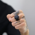 Detail of matte black compass signet ring for men with engraved nautical star pattern - Size 7 / Black