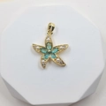 Starfish pendant with blue crystals and pearls on a white geometric platform - Starfish Style 5