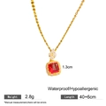 Gold star necklace with red zircon square pendant and crystal flower charm accents - Red