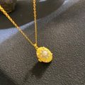 Macro detail of vintage gold locket necklace with yellow enamel and central pearl inlay - Bright Yellow Pearl Pendant (W1015)