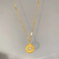 Macro detail of a golden woven cube pendant with intricate hollow texture on a link chain - Hollow Round Bead Pendant (W701)