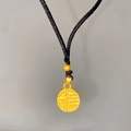 Matte gold Fu character pendant with black braided rope in a traditional Chinese style - Round Fu Character (X2190)