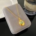 Collar de relicario ovalado dorado con concha de esmalte y estrella de mar en terciopelo - Estilo Estrella de Mar Perla Aqua (W981)