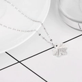 Silver maple leaf pendant necklace with detailed veins and a reflective cut chain - Silver