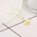 Elegant gold necklace with detailed maple leaf pendant on a flat link chain design - Gold