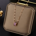 Rose gold cylinder necklace with purple pavé crystals on a luxury jewelry box - Rose Gold (Purple Rhinestone)