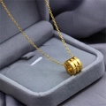 Collier en acier titane doré avec pendentif cylindrique orné d'un cristal étincelant - Or