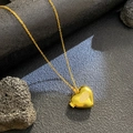 Collar de relicario de corazón dorado con motivo de ojo brillante y cadena tipo O - Corazón de Circón