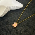 Pink cat eye four leaf clover necklace with gold chain on dark textured stone - Gold (Pink) Cat's Eye Clover Necklace