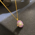 Vintage gold necklace with purple oval pendant featuring central pearl and starburst details - Purple Oval Pearl (W1018)
