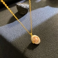 Vintage gold necklace featuring a pearl oval pendant with purple and orange enamel flowers - White Shell Enamel Floral (W1039)