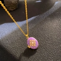 Vintage gold locket necklace with purple oval pendant featuring a star cross and pearl - Purple Enamel Star Cross (W1042)