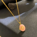 Vintage gold necklace featuring an oval pink enamel locket pendant with a star motif - Pink Enamel Octagonal Star (W1045)