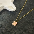Elegant gold clover necklace with pink cat eye stone petals and central sparkling diamond - Gold (Pink) Cat's Eye Clover (Lip Chain)