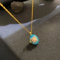 Golden necklace with blue enamel oval photo locket featuring floral patterns and pearls - Bright Blue Enamel Floral (W1047)