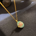 Vintage green enamel oval locket necklace with gold flower pattern and pearl accents - Pale Green Enamel Gold Floral (W1048)