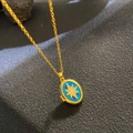 Golden cross chain with blue enamel oval locket featuring a starburst pearl detail - Blue Enamel Octagonal Star (W1063)