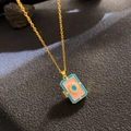 Pink and blue enamel locket pendant with small crystals on a golden necklace chain - Square Pink Blue Book (W1073)