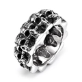 Vintage stainless steel skull ring with embossed gothic relief in a dark silver finish - US 7 / Steel