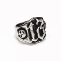 Detail of vintage silver skull ring for men with number 13 embossed on a square shield - US 6 / Steel
