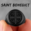Close-up of Saint Benedict medal signet ring in matte black finish with relief details - Size 6 / Black