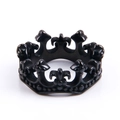 Macro view of vintage crown ring in black stainless steel with fleur-de-lis points - US 9 / Black
