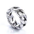 Macro detail of silver stainless steel Cuban link ring with vintage textured finish - US 7 / Steel