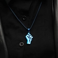 Close-up of electric blue metallic fist pendant necklace on black streetwear outfit - Blue Color Pendant Only (Without Chain)