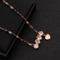 Collier LOVE en acier titane plaqué or rose 18K avec pendentif cœur en cristal - Style Lettre LOVE / Or rose