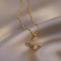Rotating windmill necklace in gold finish with sparkling zircon stones for women - Pinwheel Necklace / Gold
