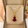 Detailed view of a gold gourd necklace with red gemstones in a soft silk jewelry box - Gold Red Gourd Style