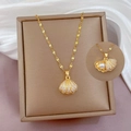 Gold shell pendant necklace with micro-paved zircons and hidden pearl inside - Lips Chain / Gold