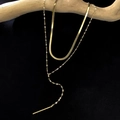Gold double-layered necklace set featuring sleek snake chain and long Y-shaped bar pendant - Double Layer Y-Shape Layered Flat Snake Chain / Gold