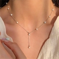 Elegant Y-shaped pearl necklace with silver chain and zircon accents on female model - Silver-Artificial Pearl Y-shaped Tassel Necklace