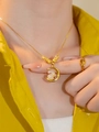 Golden necklace with a crescent moon and jade rabbit pendant on a female model - Gold Rabbit Style (6 Blessing Beads)