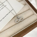 Silver infinity necklace featuring pavé white zircon stones on a classic cable chain - Necklace / Silver