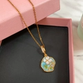 Detailed macro view of enamel flower pendant with pearl petals and zircon inlay - Gold - Oil Painting Style Four-Petal Flower Necklace