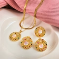 Detail of gold necklace set with pink main stone and colorful zircon evil eye design - Iridescent Pink Star Moon Eye Set (A522)