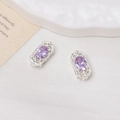 Nahaufnahme vintage silberner Ohrringe mit lila ovalen Edelsteinen und kleinen Diamanten - Silber + Lila Strass (06#)