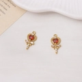 Detailed view of two gold fairy wand charms with red heart crystals and cubic zirconia - Red (04#)