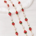 Close-up of sweet red strawberry pendants with white pearls on a golden chain necklace - Half Meter Price / 06#-Strawberry Artificial Pearl Gold Chain