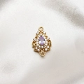 Detail of vintage gold-plated drop pendant with purple stone and micro-pave zircons - Lavender