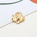 Close-up of golden metal ginkgo leaf pendants with detailed veins for DIY jewelry making - Style 02