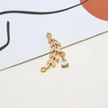 Detail of 18K gold branch pendant with marquise zircon leaves and water drop charm - Leaf Drop Style (07#)