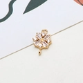 Macro shot of gold four-leaf clover pendant with clear zircons for DIY jewelry making - Rectangular Flower Connection Style (08# Dual Loop)