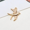 Detail of a flying swallow pendant with gold plating and sparkling white zircon stones - Swallow Shape