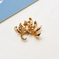 Macro detail of golden metal flower pendant for DIY jewelry making accessories - Radial Petal Flower Style (05#)