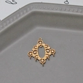 Macro detail of a baroque gold plated brass floral connector with five hanging loops - Baroque Scroll Filigree Style (05#)