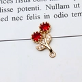Macro shot of a gold flower charm with red stones and sparkling zircon leaf details - Flower Shape / 01#Red